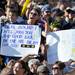 Michigan fans hold signs and cheer in the stands during the Outback Bowl at Raymond James Stadium in Tampa, Fla. on Tuesday, Jan. 1. Melanie Maxwell I AnnArbor.com